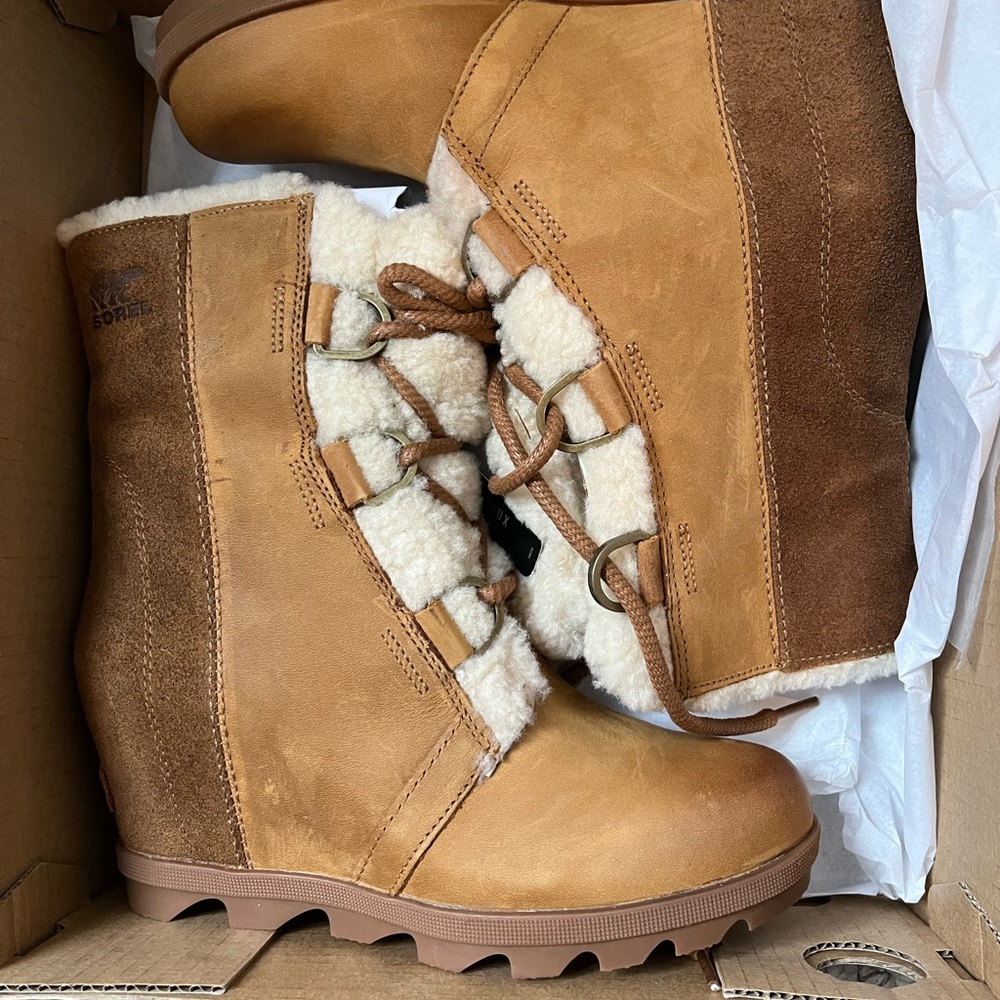 Sorel Joan of Arctic 2-toned leather with shearling lining wedge heel boots.